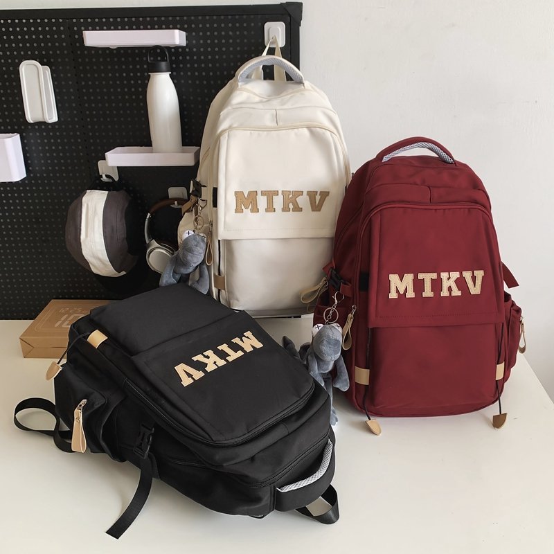 Large capacity zipper sealed student backpack with polyester lining and waterproof design, suitable for outdoor use by both boys and girls